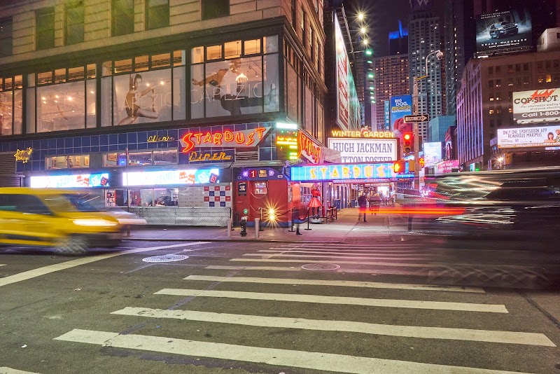 Food and interior photo 5 at Ellen's Stardust Diner in New York
