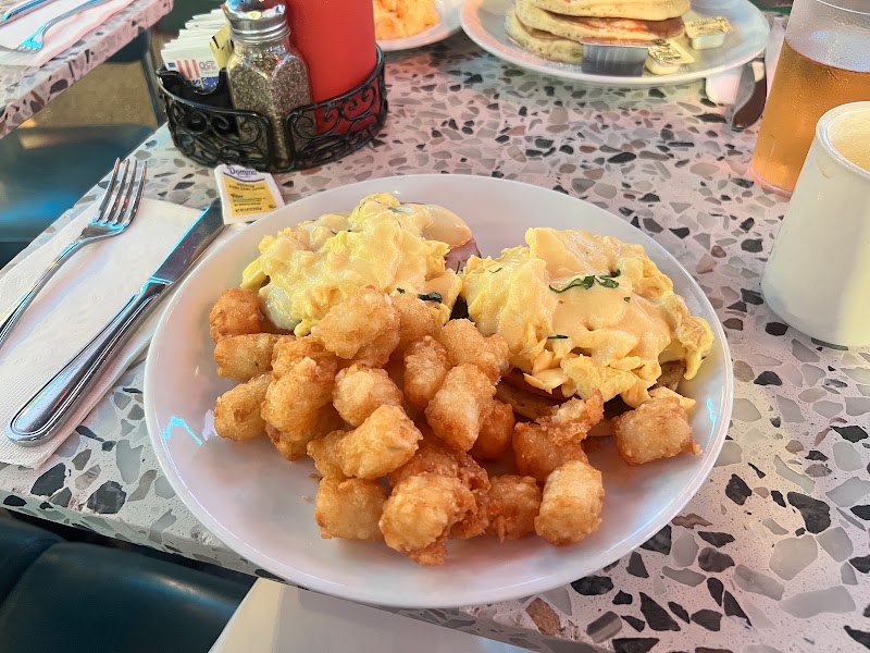 Food and interior photo 4 at Ellen's Stardust Diner in New York