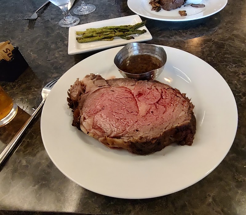 Food and interior photo 3 at Delmonico Grill in Rapid City