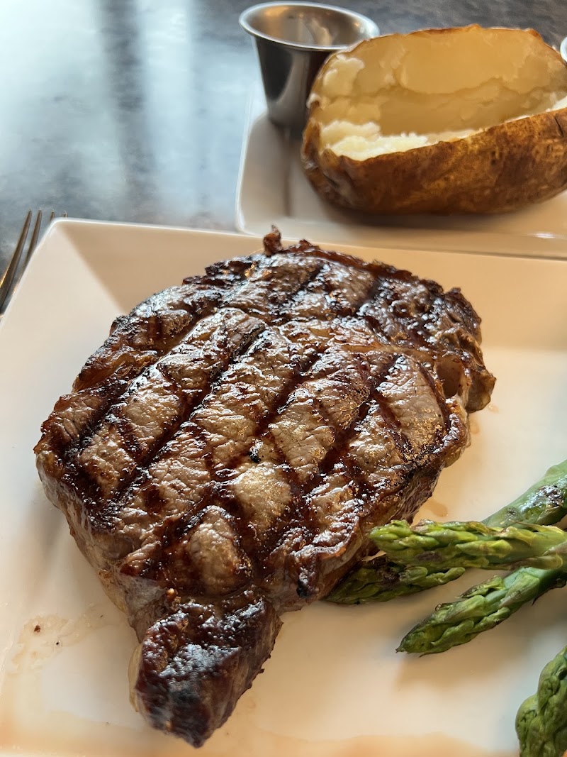 Food and interior photo 2 at Delmonico Grill in Rapid City